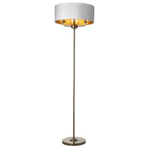 Highclere 3 light floor lamp standard in antique brass plate with vintage white shade on white background