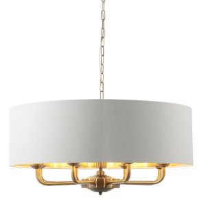 Highclere 8 light pendant in antique brass on white background