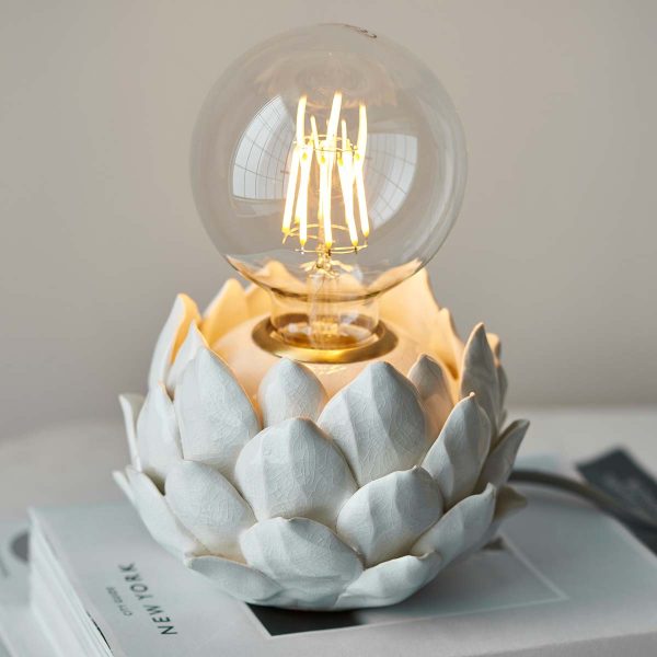 Artichoke small oatmeal ceramic table lamp shown on table