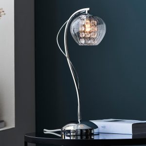 Mesmer polished chrome table lamp with ribbed glass shade on living room table