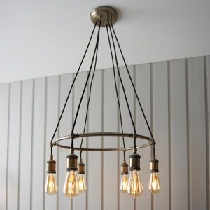 Hal 6 light ceiling pendant in antique brass on lounge ceiling