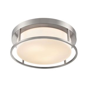 Franklite Blaine 2 light flush ceiling light in satin nickel with opal glass shade, on white background, lit.