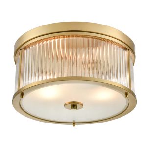 Franklite Bonham 2 light traditional flush ceiling light in aged brass, shown lit on white background.