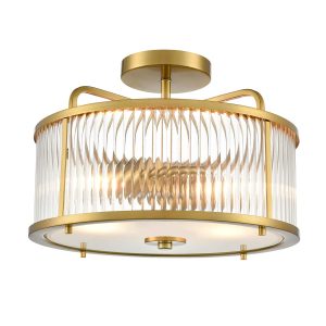 Franklite Bonham 2 light traditional semi flush ceiling light in aged brass, shown lit on white background.