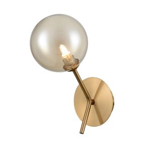 Franklite Cosmic modern single wall light in antique gold with amber glass shade on white background.