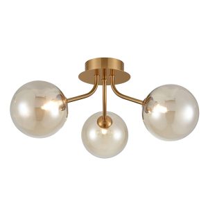 Franklite Cosmic modern 3 light semi flush ceiling light in antique gold with amber glass shades, on white background.