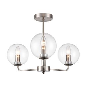 Franklite Court 3 light satin nickel semi flush ceiling light with clear glass globes, on white background, lit.