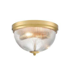 Small Franklite Cupola 2 light aged brass flush ceiling light with ribbed glass shade, on white background, lit.