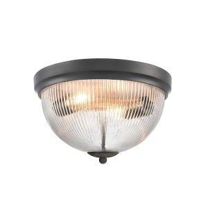 Franklite Cupola 2 light matt black flush ceiling light with ribbed glass shade, on white background, lit.