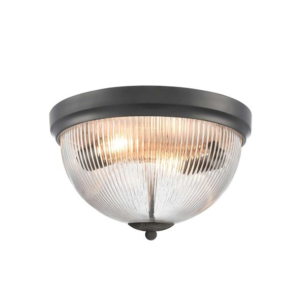 Franklite Cupola 2 light matt black flush ceiling light with ribbed glass shade, on white background, lit.
