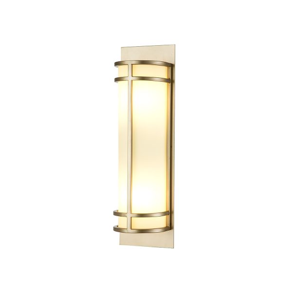 Feiss Fusion 2 light wall light in painted natural brass on white background, lit.