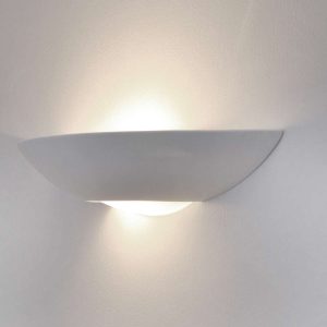 Medium classic paintable ceramic dish up and down wall washer light on grey background, lit.
