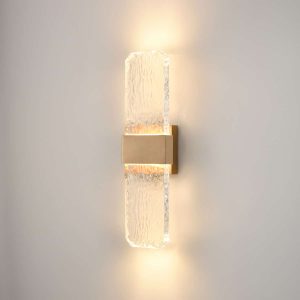 Franklite Frost LED large IP54 wall light in aged brass with cast rippled glass, on grey background.