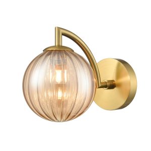 Franklite Franklite Globe single bathroom wall light in aged brass with ribbed amber glass shade, on white background.