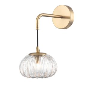 Franklite Harvest ribbed glass single wall light in aged brass, on white background.