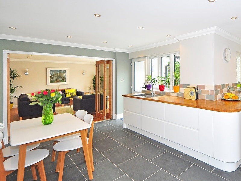 Modern open-plan kitchen scene with downlights fitted.