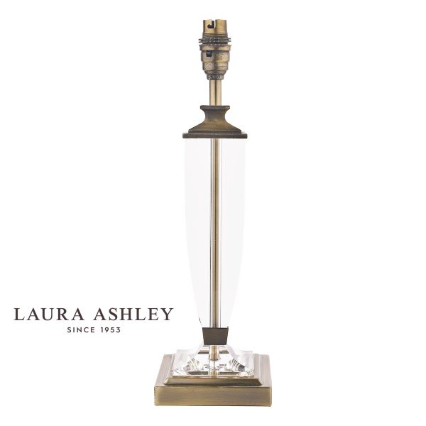 Carson medium crystal table lamp base only with antique brass finish metalwork, without shade on white background.