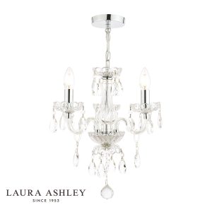 Laura Ashley Harriet 3 light crystal chandelier in polished chrome, on white background, lit.