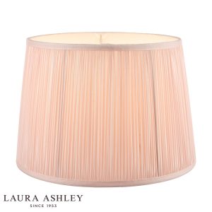 Laura Ashley Hemsley 10-inch diameter pleated pink silk drum shade, on white background, lit.