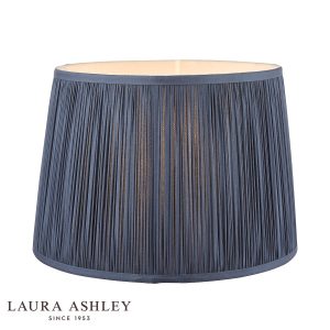 Laura Ashley Hemsley 10-inch diameter pleated blue silk drum shade, on white background, lit.