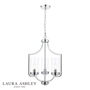 The Laura Ashley Joseph 3 light chandelier in polished chrome with glass shades, on white background, lit.