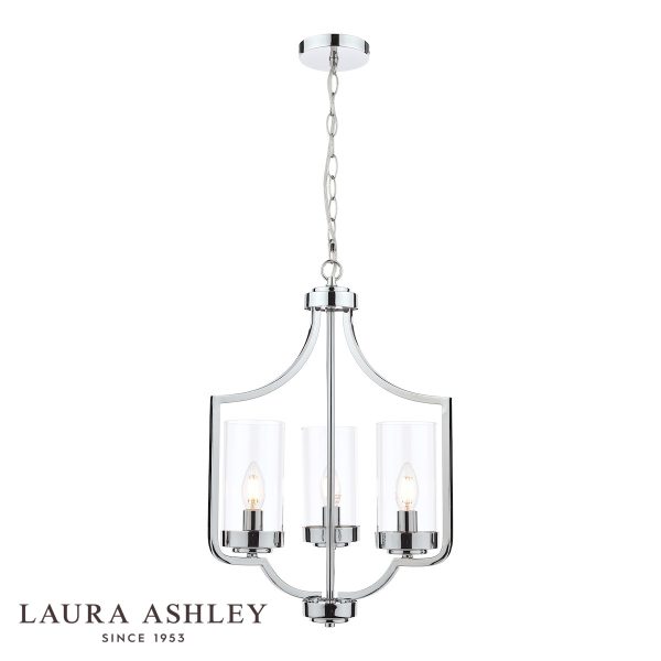 The Laura Ashley Joseph 3 light chandelier in polished chrome with glass shades, on white background, lit.
