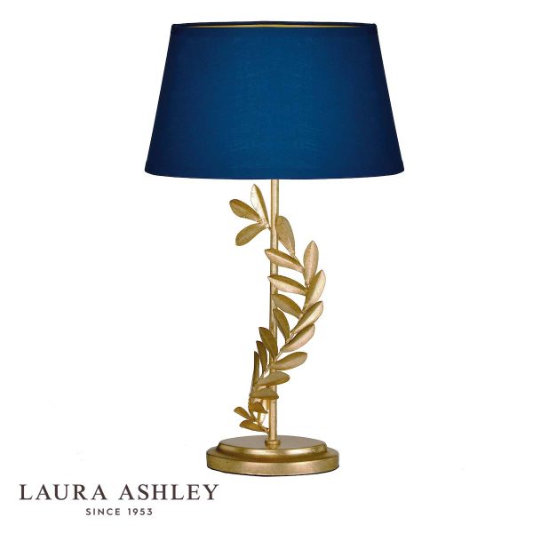 Archer gold leaf table lamp with navy blue shade by Laura Ashley on white background, with logo.