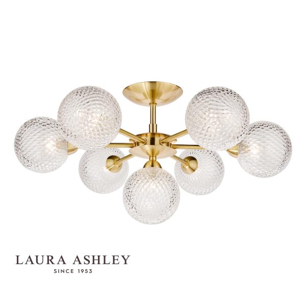 The Atherton 7 light semi flush ceiling light in satin brass finish with glass shades by Laura Ashley, shown on white background, with logo.