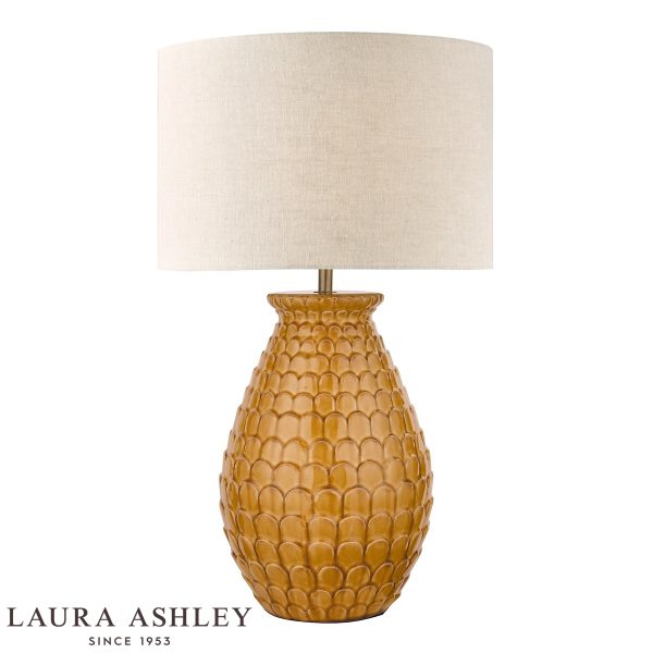 Laura Ashley Liza orange ceramic table lamp with natural linen shade, on white background.