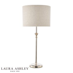 Laura Ashley Highgrove table lamp in polished nickel with natural linen shade, on white background, lit.