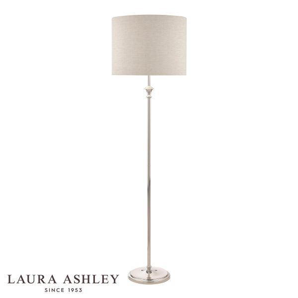 Laura Ashley Highgrove floor lamp in polished nickel with natural linen shade, on white background, lit.