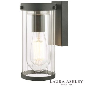 Arthur outdoor wall light in matt black finish with clear ribbed glass shade and rated IP44, on white background, with Laura Ashley Logo.