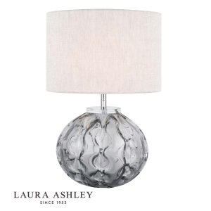 Laura Ashley Elderdale smoked glass table lamp with grey shade on white background, with logo.