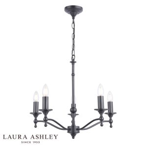 Laura Ashley Ludchurch 5 light chandelier in industrial black, on white background, lit.