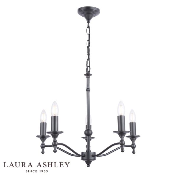 Laura Ashley Ludchurch 5 light chandelier in industrial black, on white background, lit.