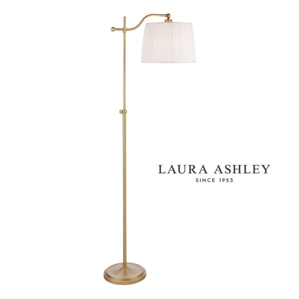 Laura Ashley Hemsley adjustable floor lamp in matt antique brass on white background, lit.