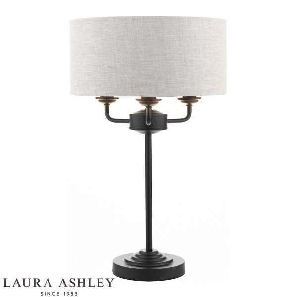 Laura Ashley Sorrento 3 light table lamp in matt black on white background, lit.