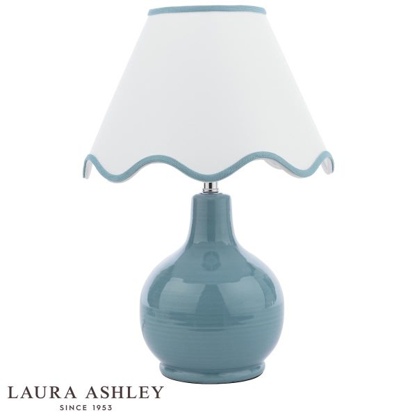 Bramhope blue ceramic table lamp with cream cotton mix shade by Laura Ashley on white background.
