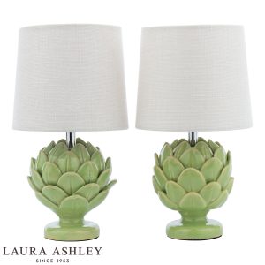 Laura Ashley green ceramic Artichoke table lamp with ivory linen shade, on white background unlit.