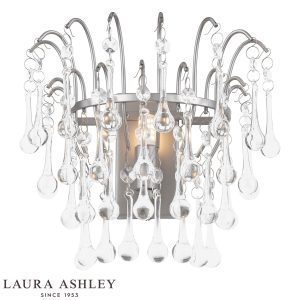 Willow single wall light in satin pewter finish with crystal drops by Laura Ashley, on white background, lit.