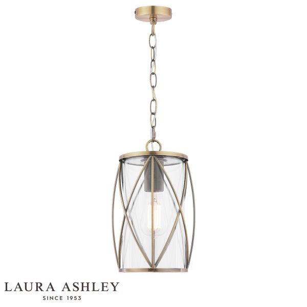 Beckworth single light pendant in antique brass finish with clear glass by Laura Ashley, full height on white background, lit.