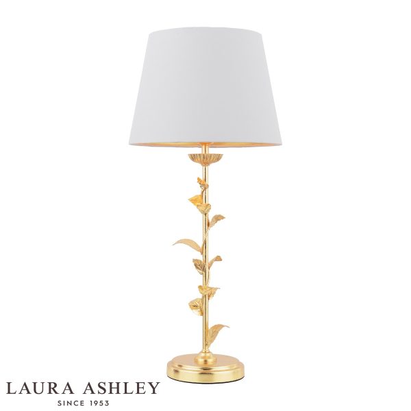 Laura Ashley Halton table lamp in distressed gold leaf with cream shade, on white background.