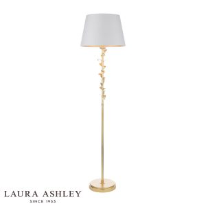 Laura Ashley Halton floor lamp in distressed gold leaf with cream shade, on white background.