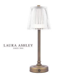 Laura Ashley Callaghan rechargeable LED touch lamp in matt antique brass on white background.