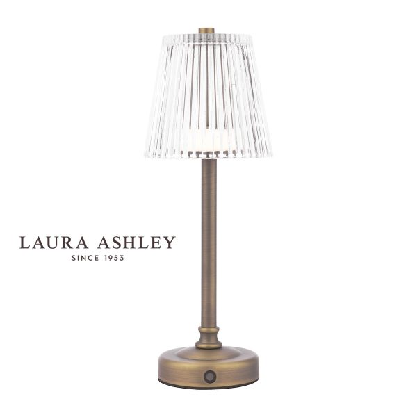 Laura Ashley Callaghan rechargeable LED touch lamp in matt antique brass on white background.