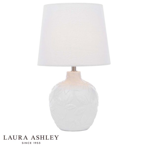Redhall white ceramic table lamp with cream linen shade and chrome metalwork by Laura Ashley, on white background, with logo.