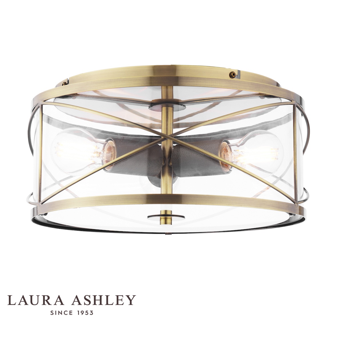 Beckworth 3 light flush in antique brass finish with clear glass by Laura Ashley, on white background, lit.
