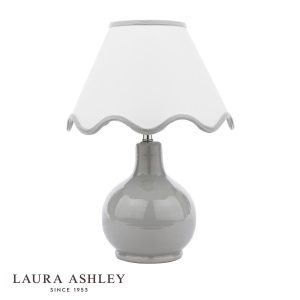 Bramhope grey ceramic table lamp with cream cotton mix shade by Laura Ashley on white background.