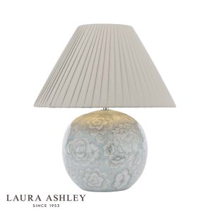 Laura Ashley Montford blue ceramic table lamp with taupe faux silk shade, on white background with logo.