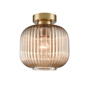 Franklite Mezcla flush aged brass ceiling light with ribbed amber glass shade, on white background.